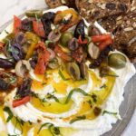 Goat-Cheese-spread-with-sun-dried-tomatoes,-olives-and-roasted-red-peppers