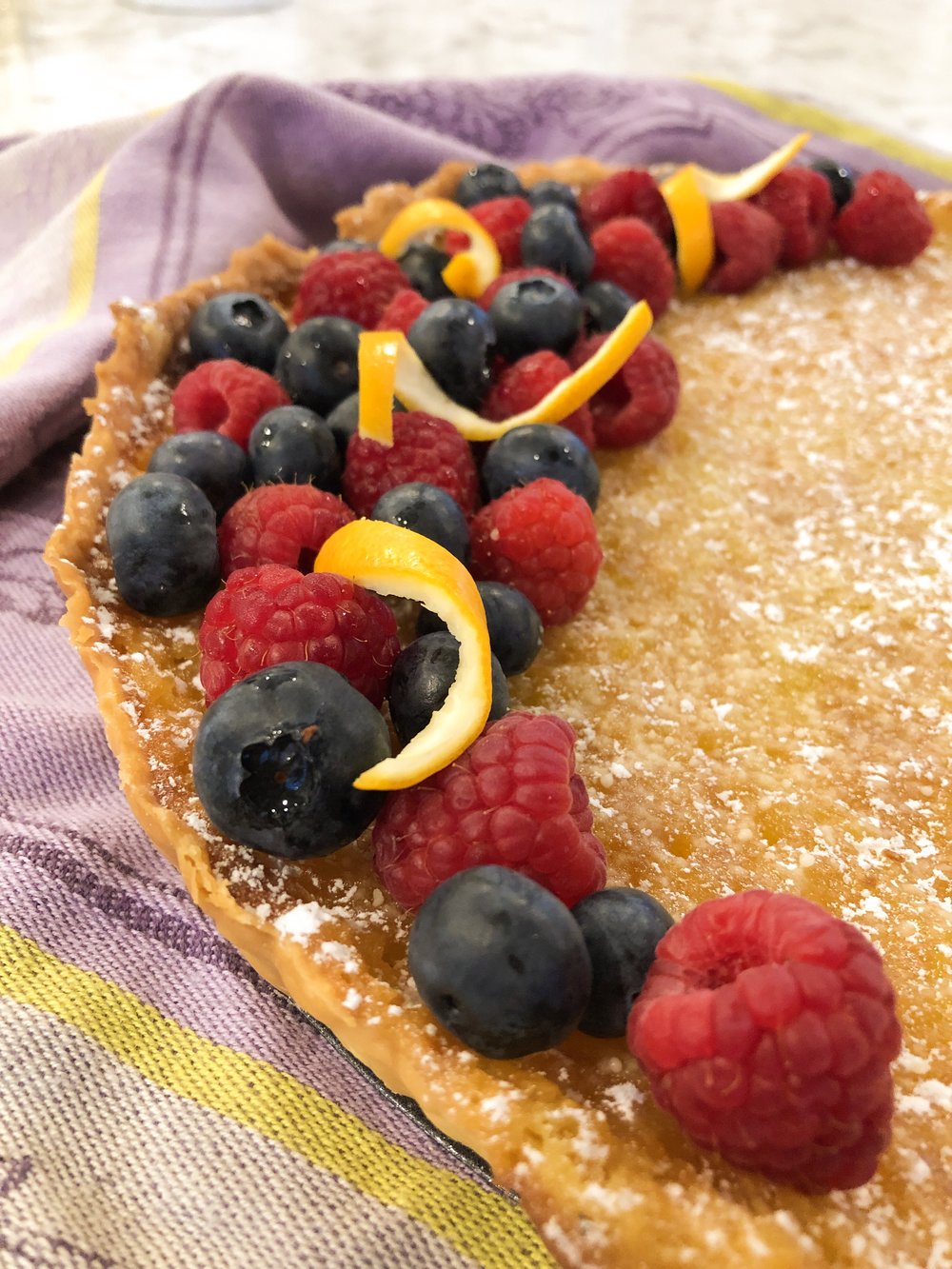 Dust with powdered sugar and garnish with fresh fruit and mint, if you have it.