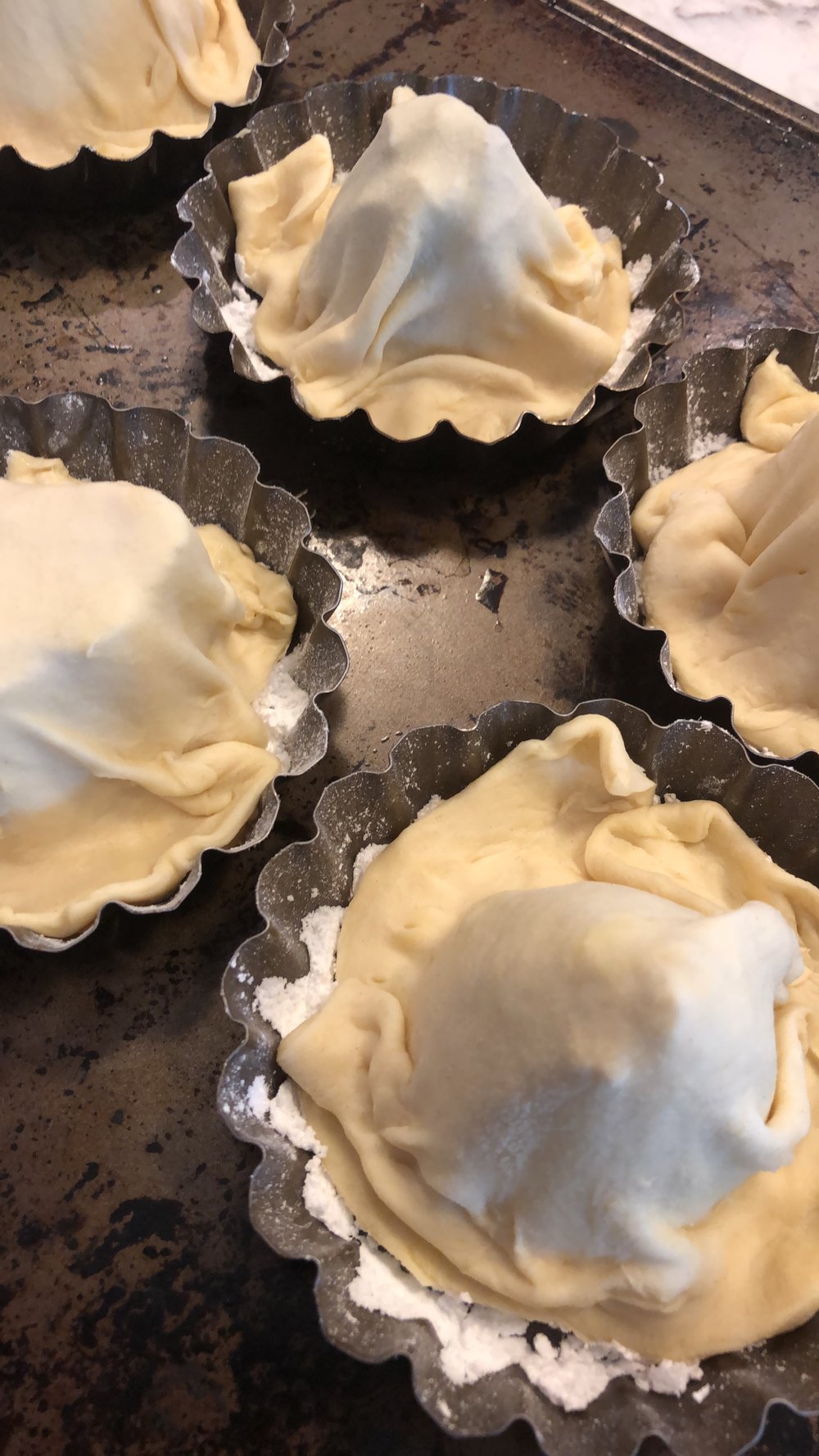 Drape the pastry over the endive. Note the 'extra' puddeling in the tart pan.