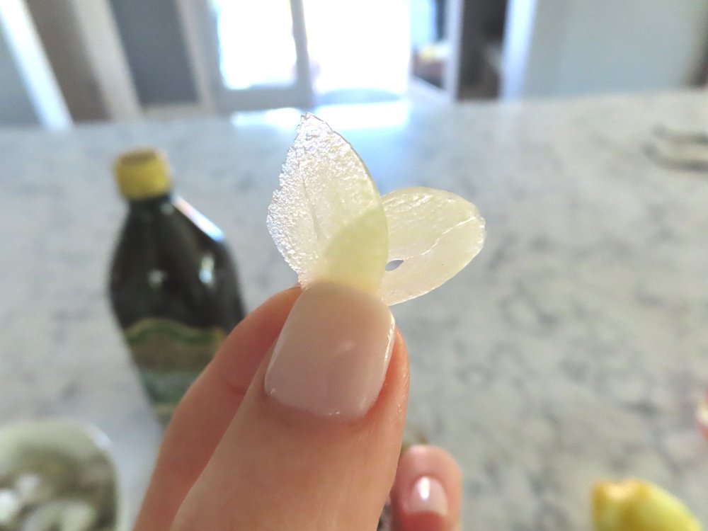 Garlic sliced paper thin.
