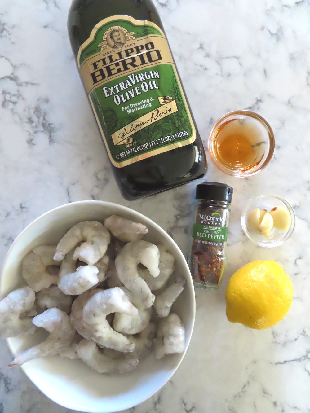 Ingredients - Olive oil, sherry, lemon, garlic, crushed red pepper and shrimp. Typically I would use fresh shrimp but I had these in the freezer and thought I would use them up.