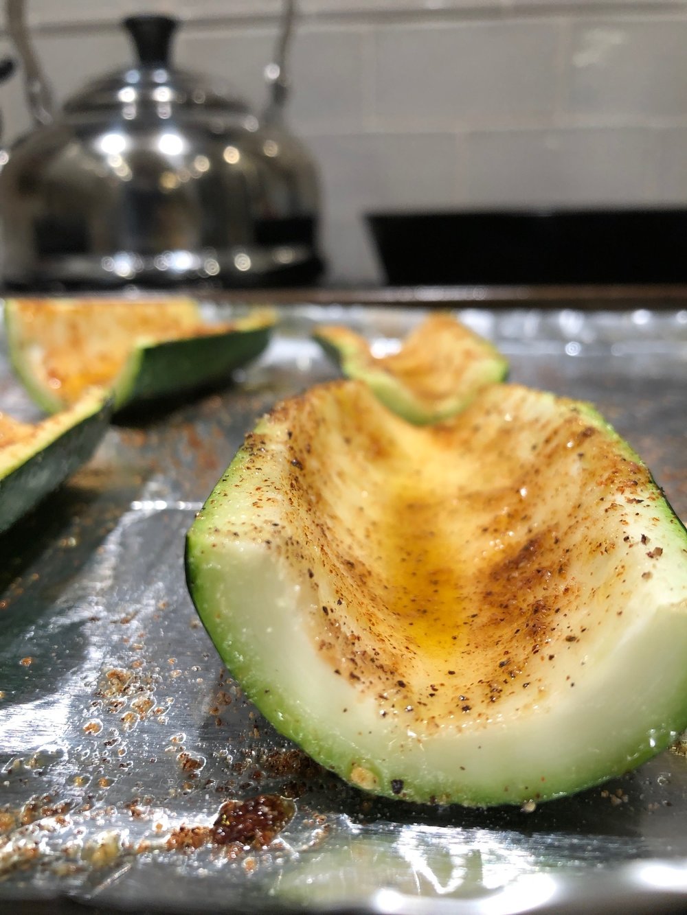 Step 2 - lightly brush with olive oil and sprinkle with paprika, garlic powder, salt and pepper then bake for 12 min