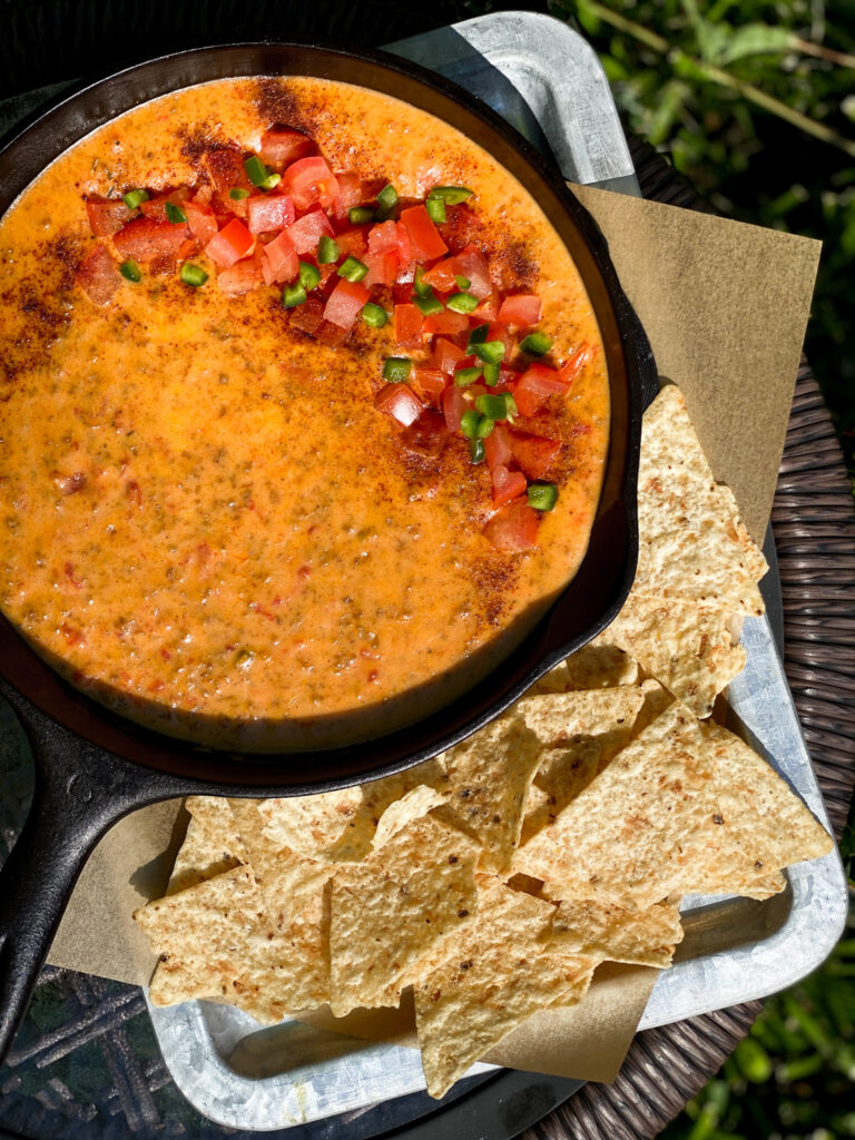 CHORIZO QUESO DIP with tomatoes and jalapenos