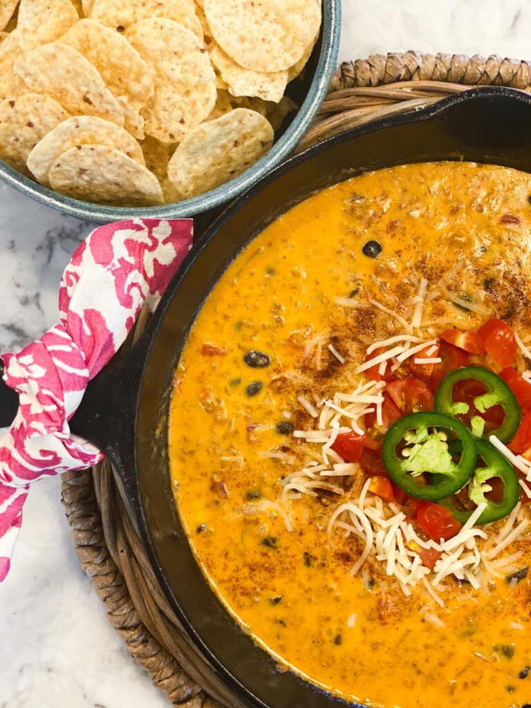 LOADED CHORIZO QUESO in a cast iron skillet