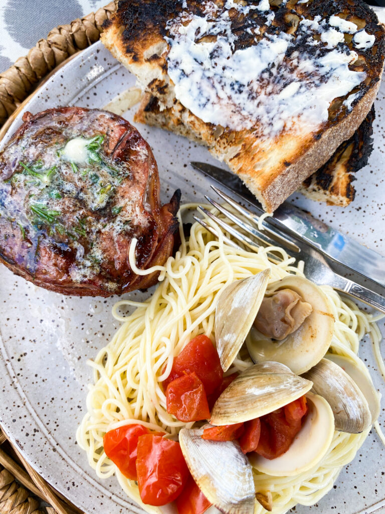 Light, garlicky and super quick. These clams are the perfect summertime appetizer!  