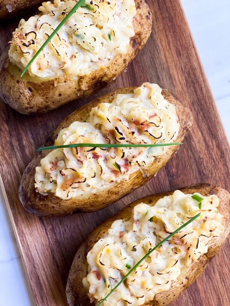 https://desociointhekitchen.com/wp-content/uploads/2021/07/BOURSIN-CHEESE-TWICE-BAKED-POTATOES-768x1024.jpg