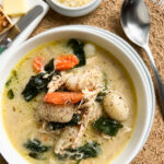 Gnocchi chicken soup with carrot and spinach
