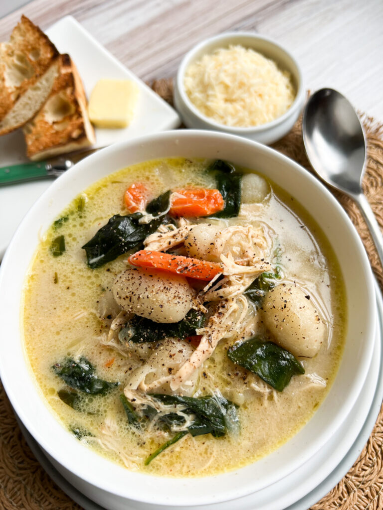 Gnocchi chicken soup with carrot and spinach